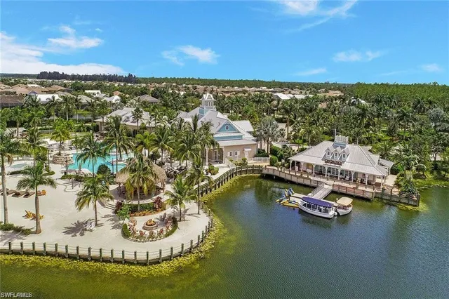a front view of a house with a lake view