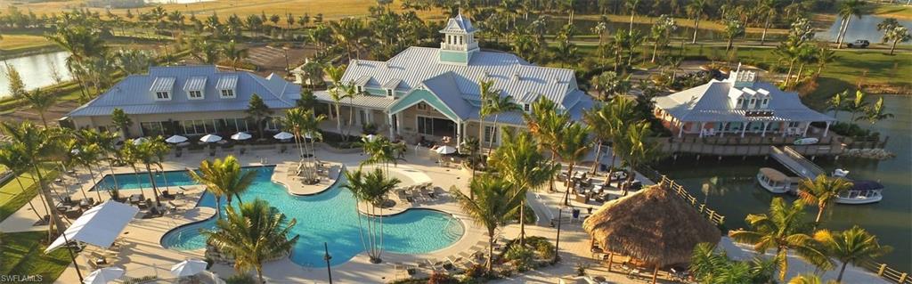 14614 Stillwater Way Naples, FL 34114 - Photo 38 of 47 a view of multiple houses with yard