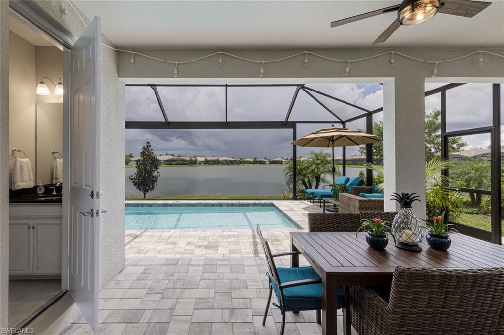 14614 Stillwater Way Naples, FL 34114 - Photo 7 of 47 a view of a dining room with furniture