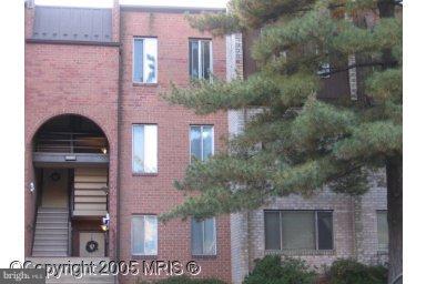 5083 7th Road South, Unit 102 Arlington, VA 22204 - Photo 1 of 1 a front view of a house with plants