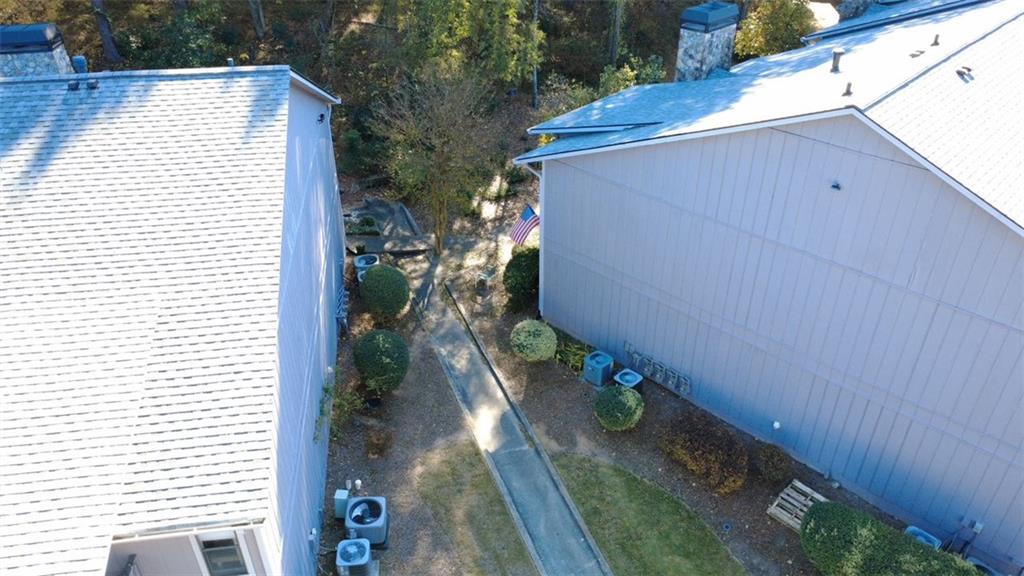 3934 Woodridge Way Tucker, GA 30084 - Photo 56 of 75 a view of a house with a backyard