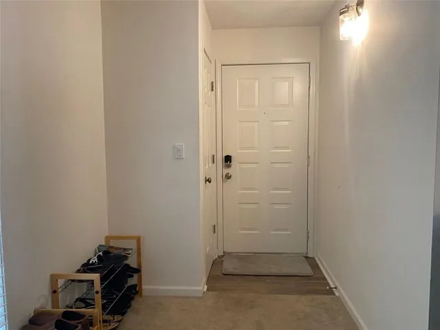 a kitchen with a sink stove and refrigerator