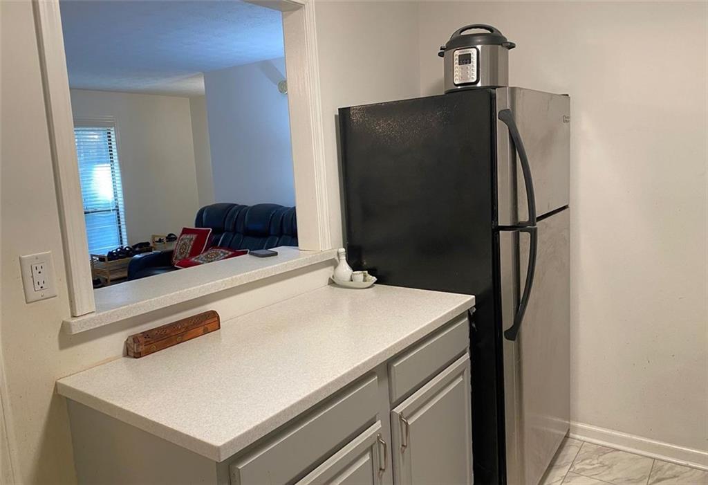3934 Woodridge Way Tucker, GA 30084 - Photo 10 of 75 a utility room with washer and dryer