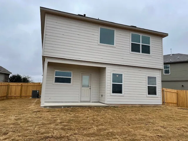 a house that has a window in front of it