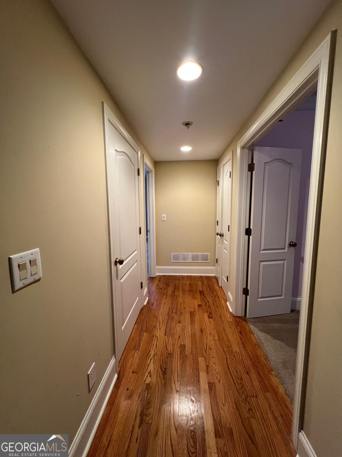 2301 Castlemaine Drive Northwest Duluth, GA 30097 - Photo 40 of 89 a view of empty room with wooden floor