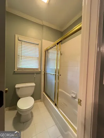 a bathroom with a sink vanity and a mirror
