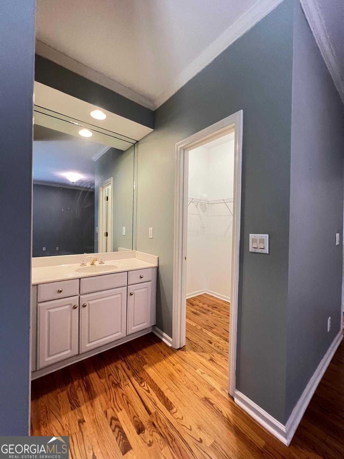 2301 Castlemaine Drive Northwest Duluth, GA 30097 - Photo 49 of 89 a spacious bathroom with a granite countertop sink and a mirror