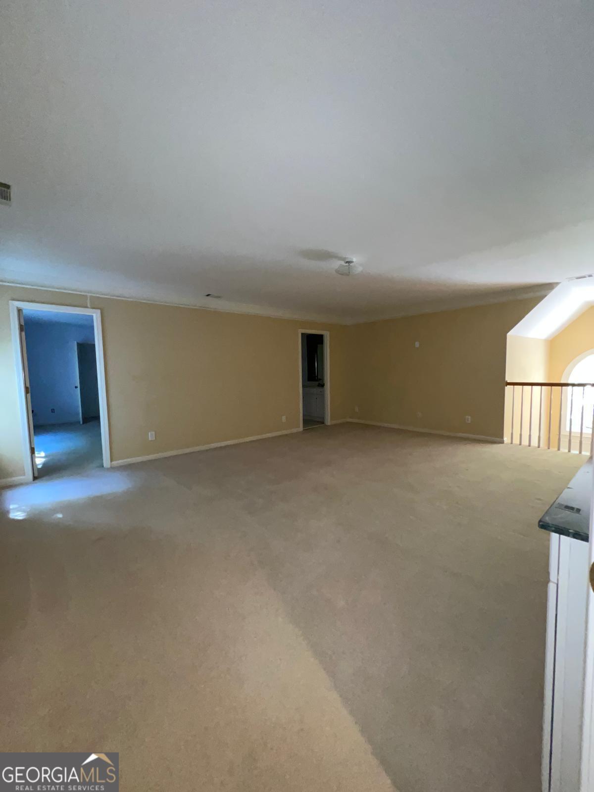 2301 Castlemaine Drive Northwest Duluth, GA 30097 - Photo 64 of 89 a view of an empty room with a window