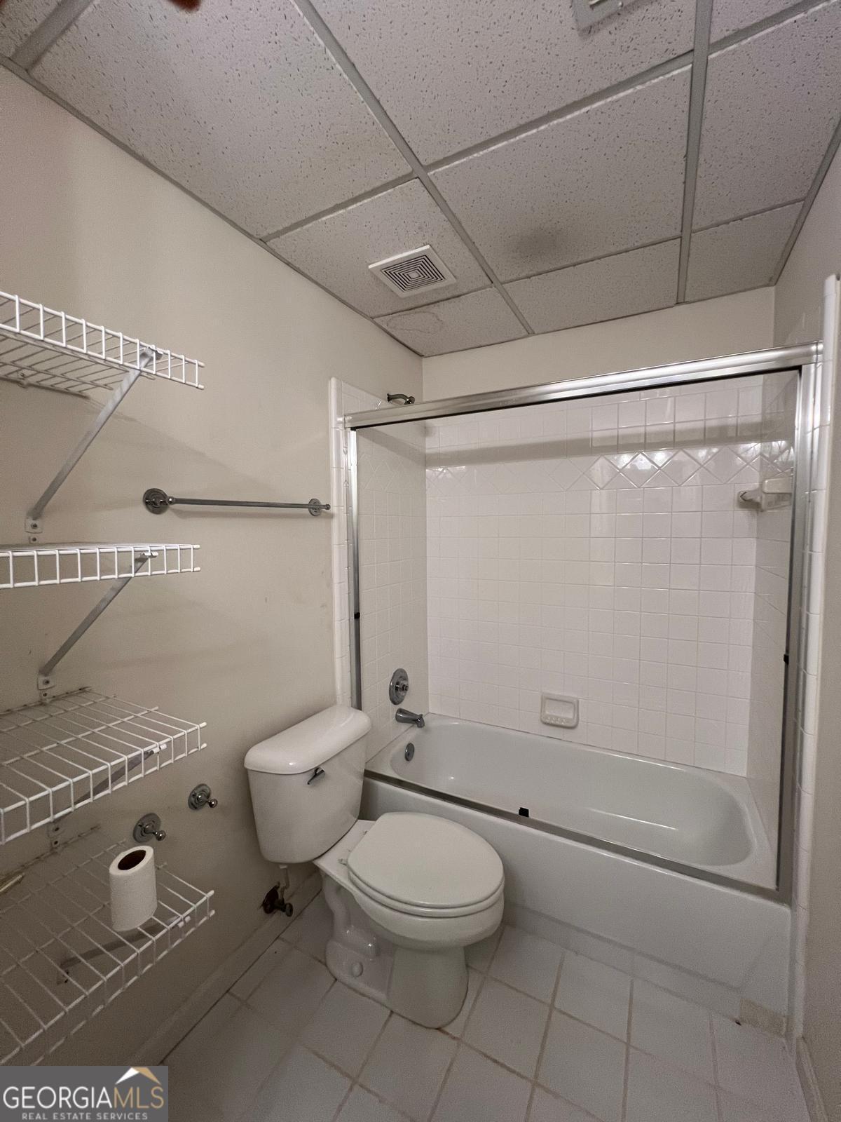 2301 Castlemaine Drive Northwest Duluth, GA 30097 - Photo 79 of 89 a bathroom with a toilet and a shower