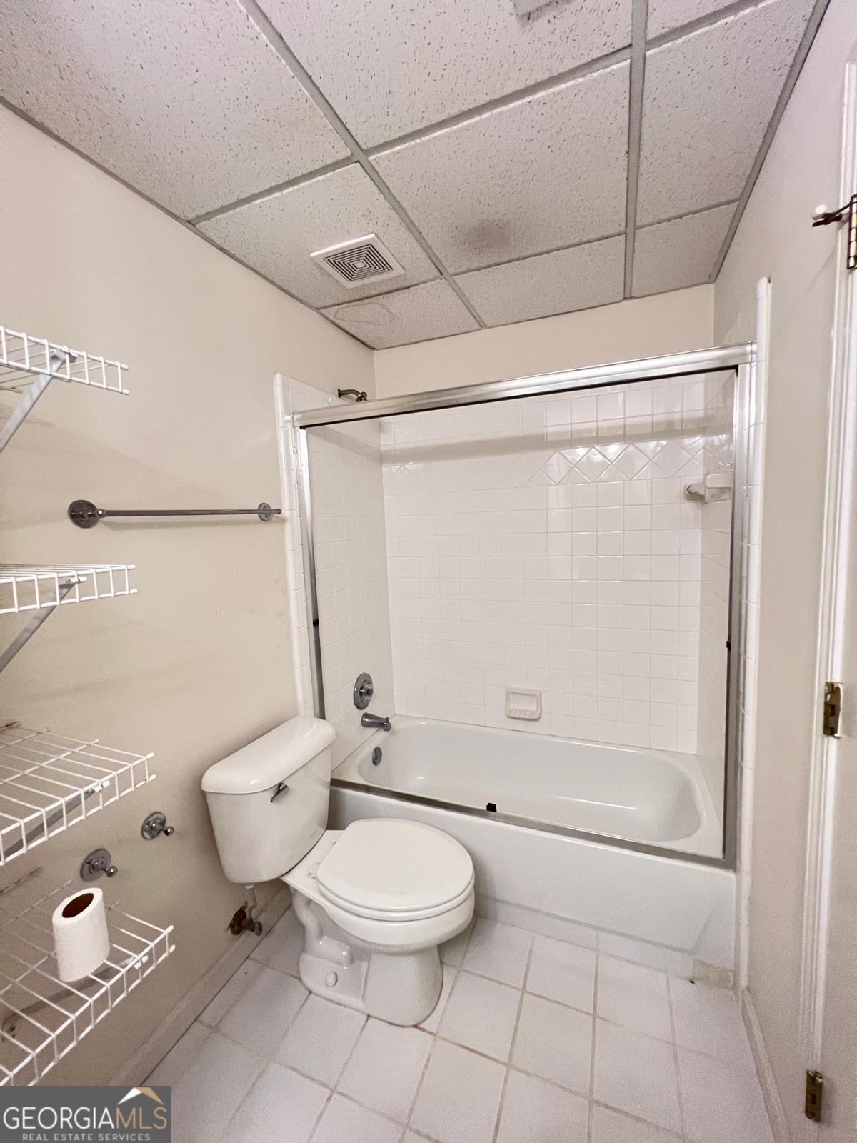 2301 Castlemaine Drive Northwest Duluth, GA 30097 - Photo 80 of 89 a bathroom with a toilet a sink and shower