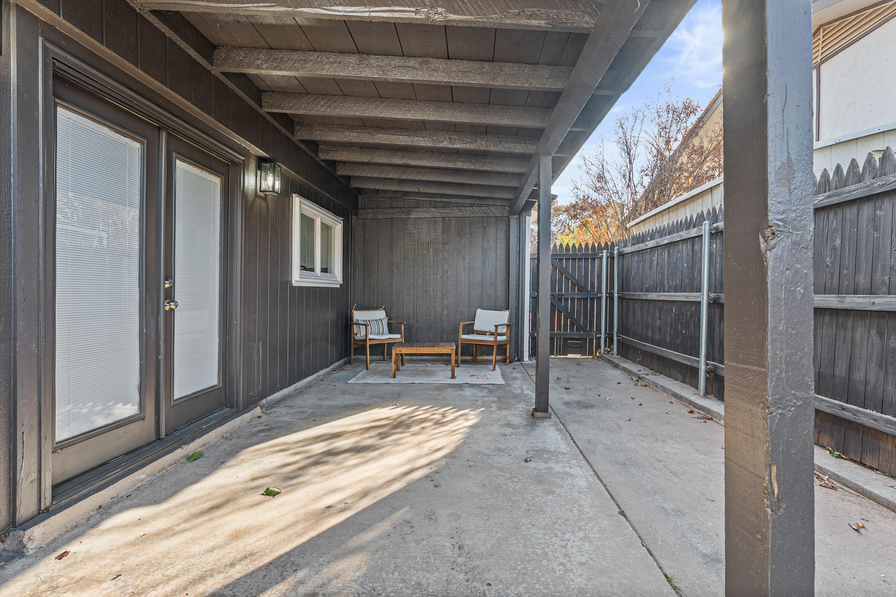 4510 77th Street Lubbock, TX 79424 - Photo 25 of 26 a view of an outdoor space with wooden floor and a bench
