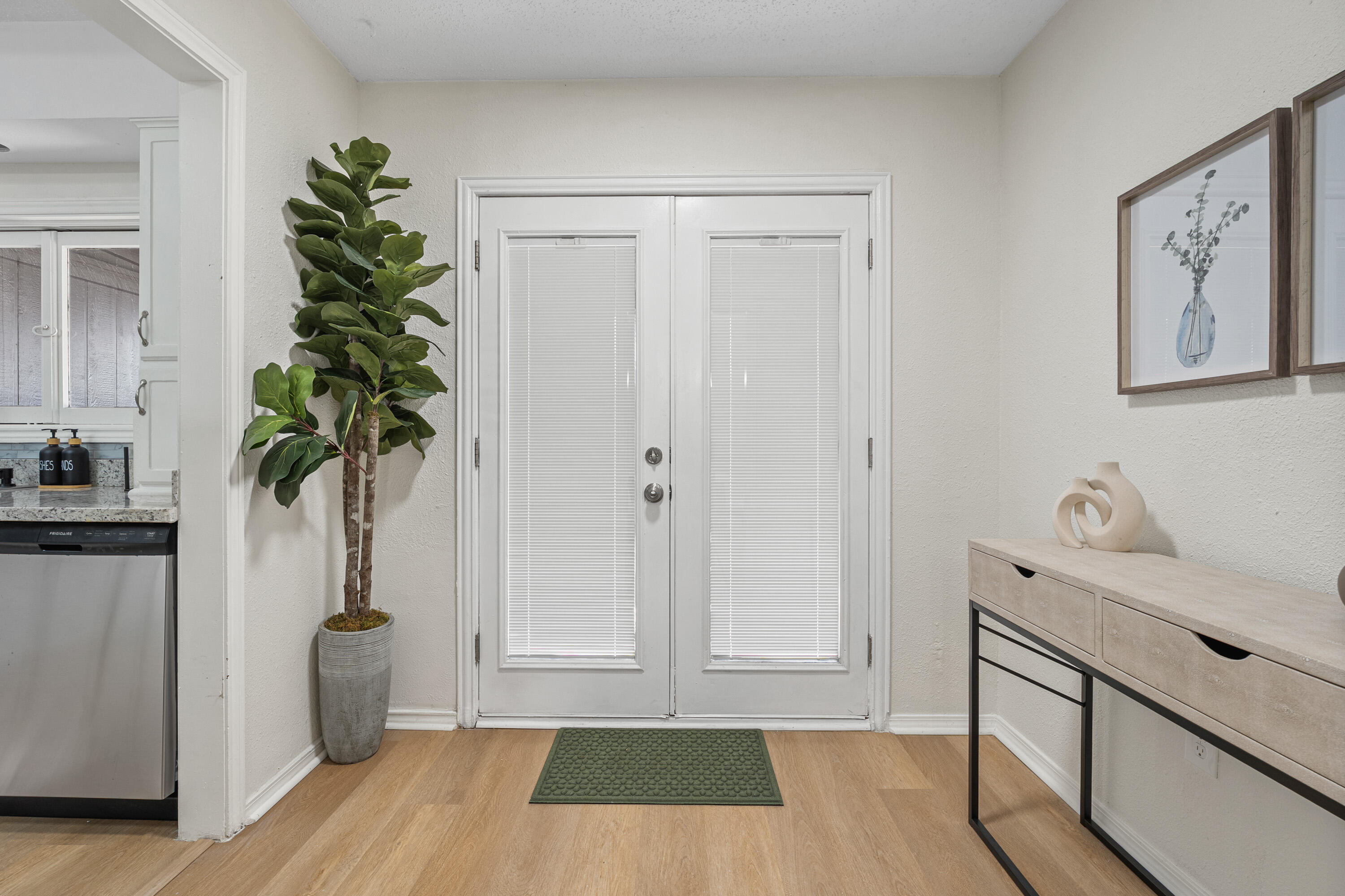 4510 77th Street Lubbock, TX 79424 - Photo 7 of 26 a view of entryway with wooden floor