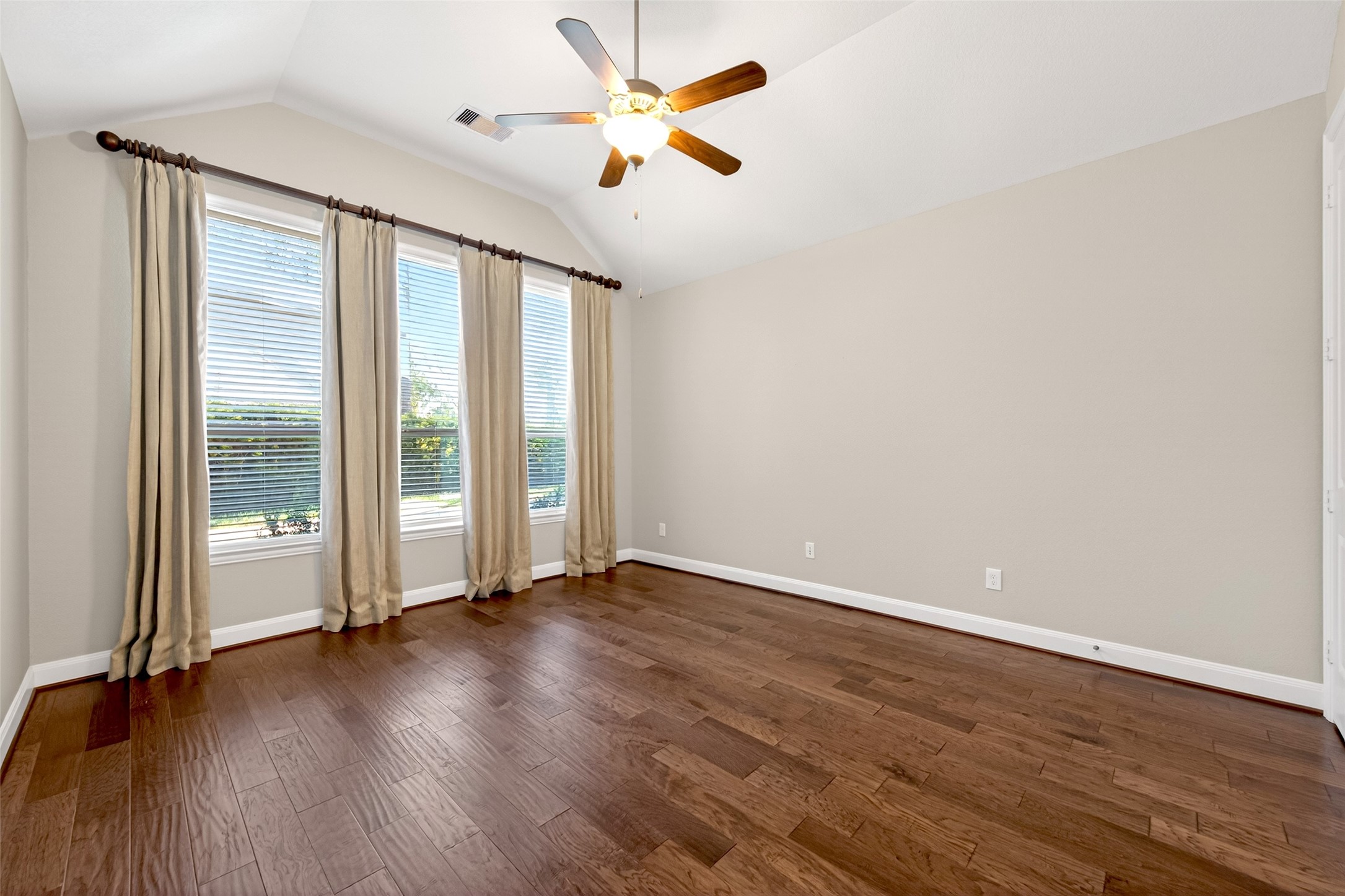 14 South Sawbridge Circle Spring, TX 77389 - Photo 31 of 45 wooden floor in an empty room with a window