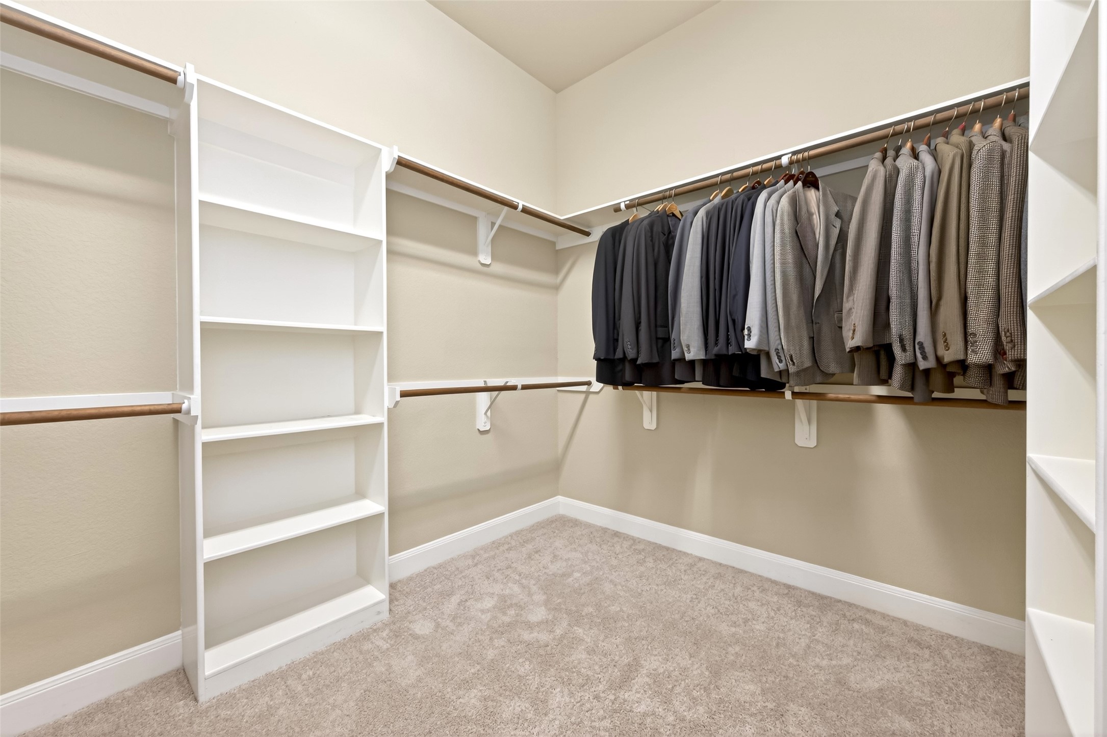 14 South Sawbridge Circle Spring, TX 77389 - Photo 37 of 45 a view of walk in closet with empty racks