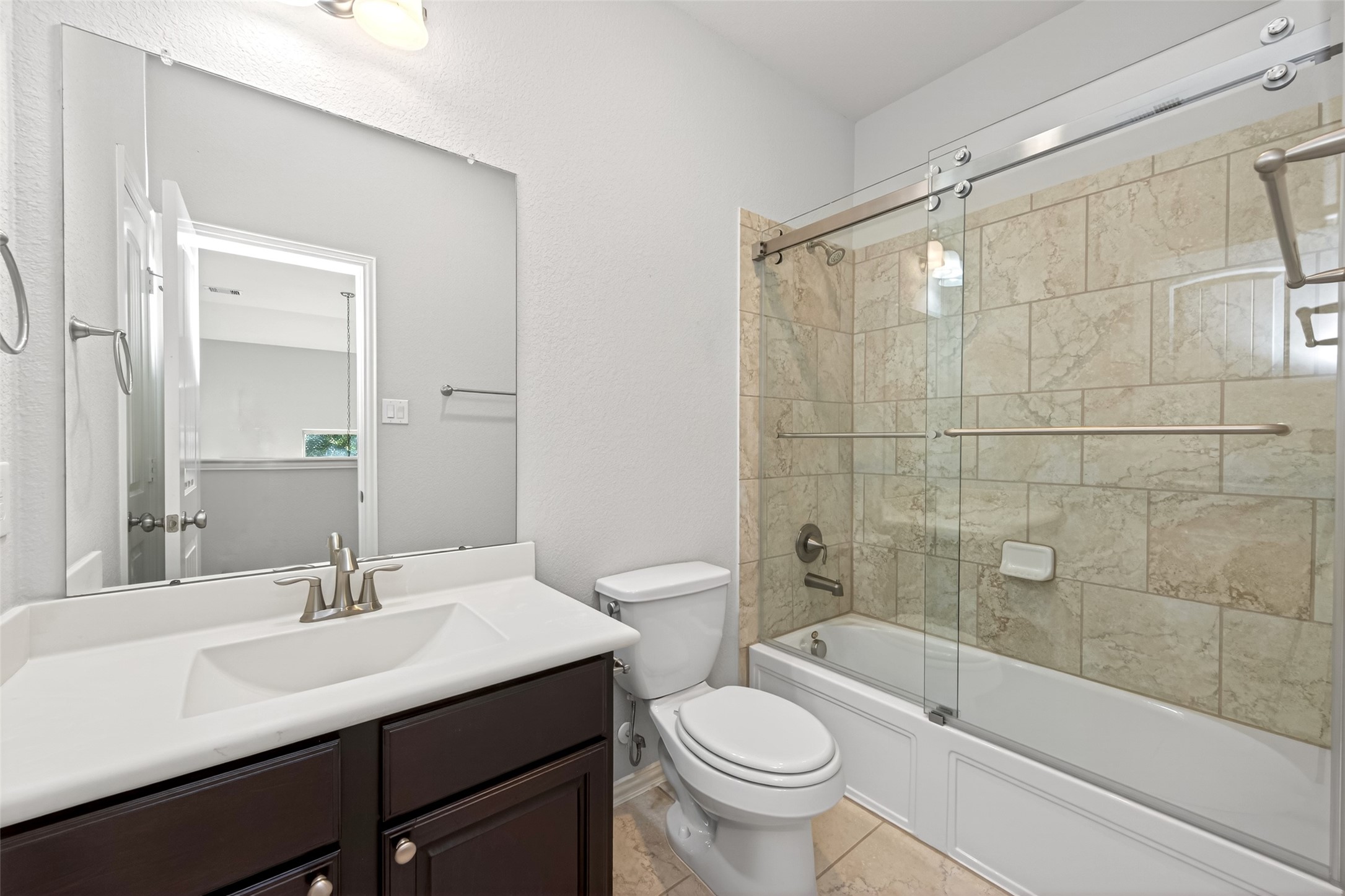 14 South Sawbridge Circle Spring, TX 77389 - Photo 42 of 45 a bathroom with a sink a toilet and shower