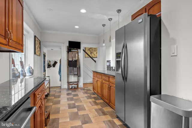 a bathroom with a sink a vanity and a mirror