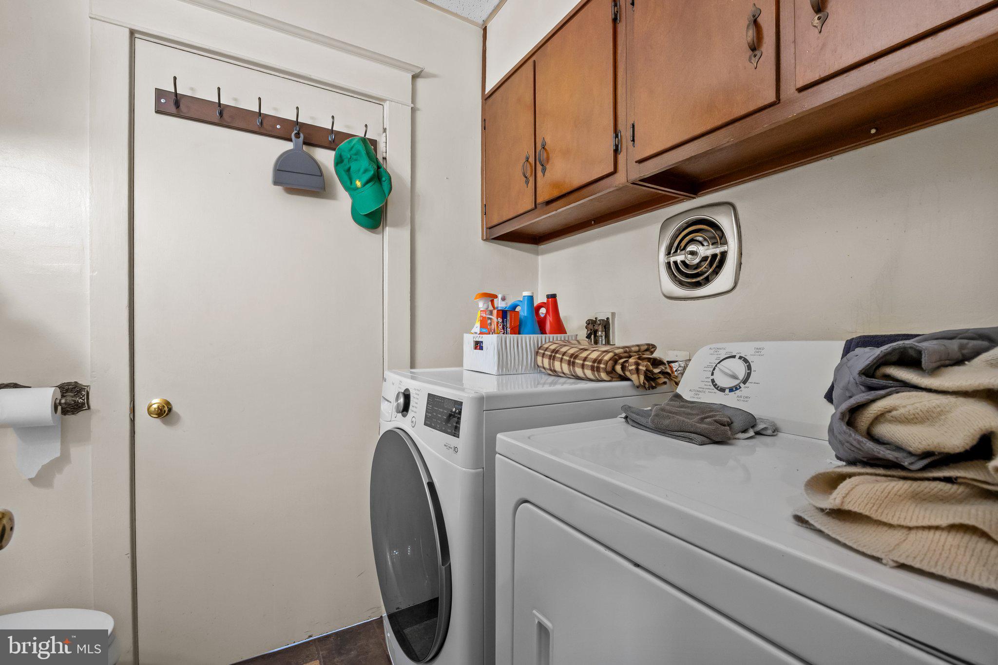 600 Runnymede Avenue Jenkintown, PA 19046 - Photo 24 of 51 a view of a storage and utility room with washer and dryer
