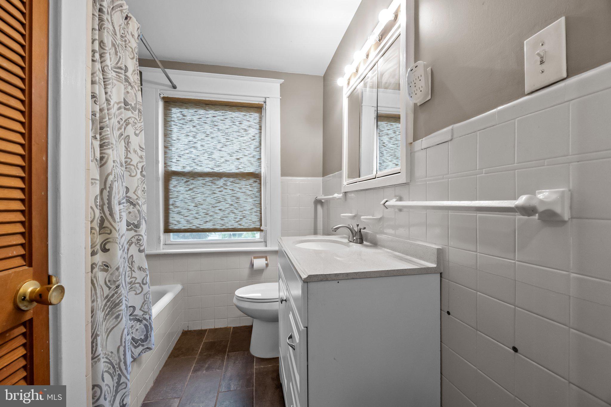 600 Runnymede Avenue Jenkintown, PA 19046 - Photo 29 of 51 a bathroom with a sink toilet a tub and shower