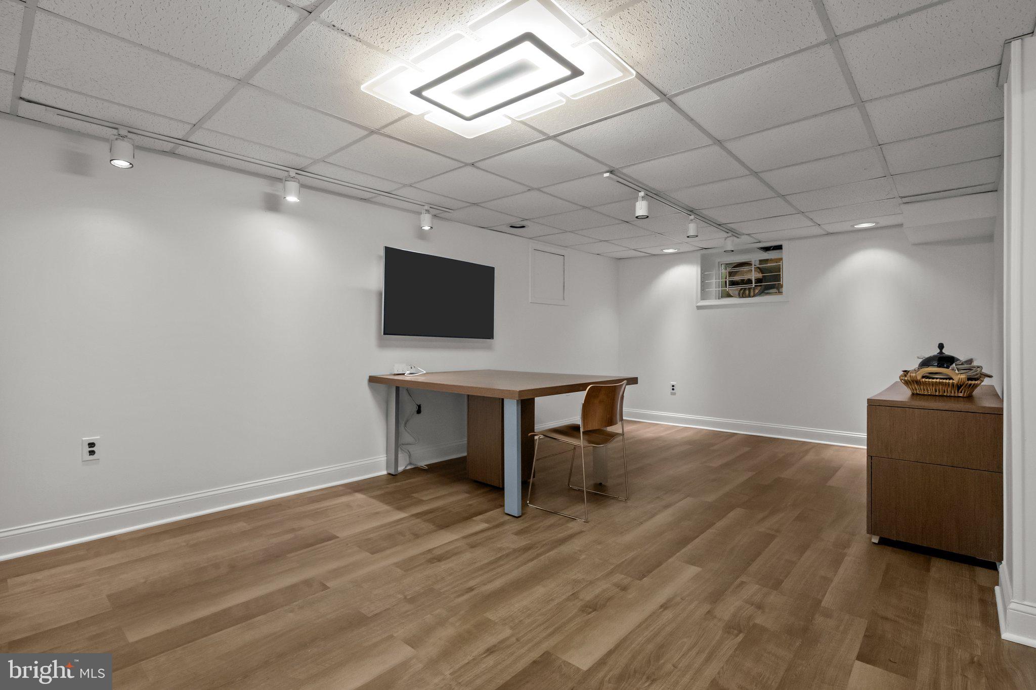 600 Runnymede Avenue Jenkintown, PA 19046 - Photo 35 of 51 a room with furniture and a wooden floor