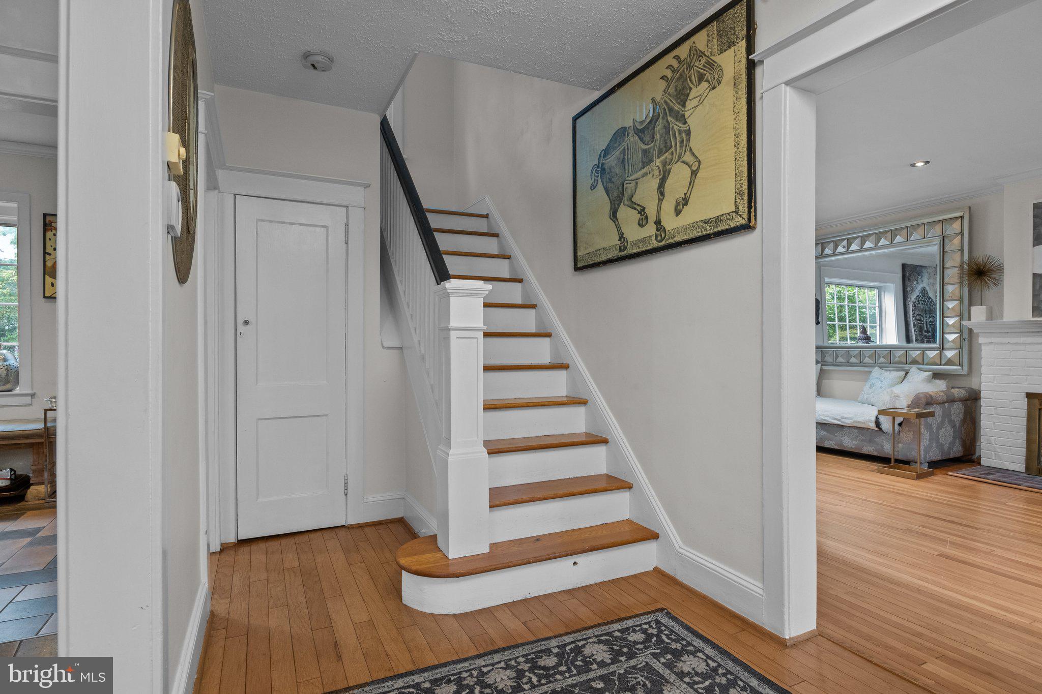 600 Runnymede Avenue Jenkintown, PA 19046 - Photo 4 of 51 a view of entryway with wooden floor and stairs