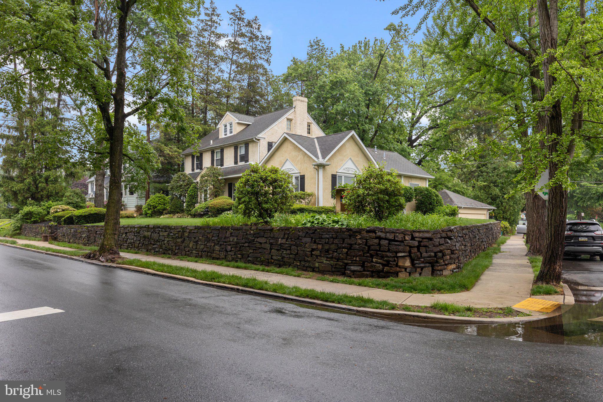 600 Runnymede Avenue Jenkintown, PA 19046 - Photo 46 of 51 a front view of a house with a garden