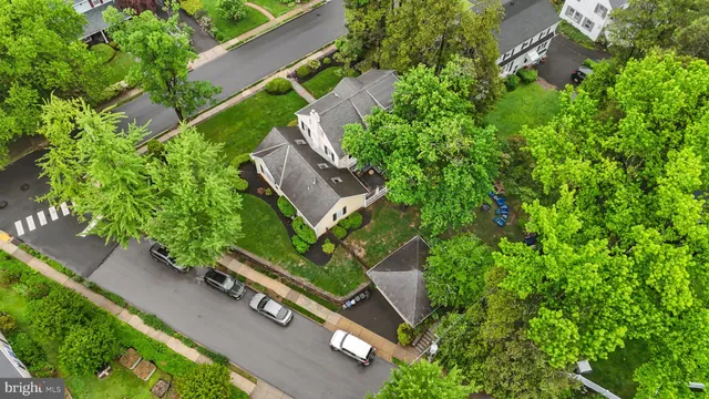 an aerial view of a house with a garden