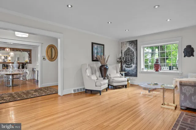 a living room with furniture and a table