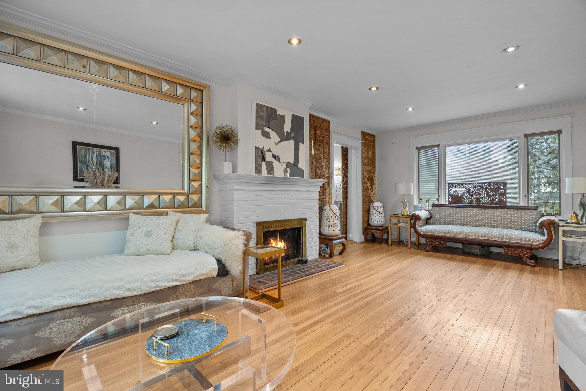 600 Runnymede Avenue Jenkintown, PA 19046 - Photo 8 of 51 a living room with furniture and a fireplace