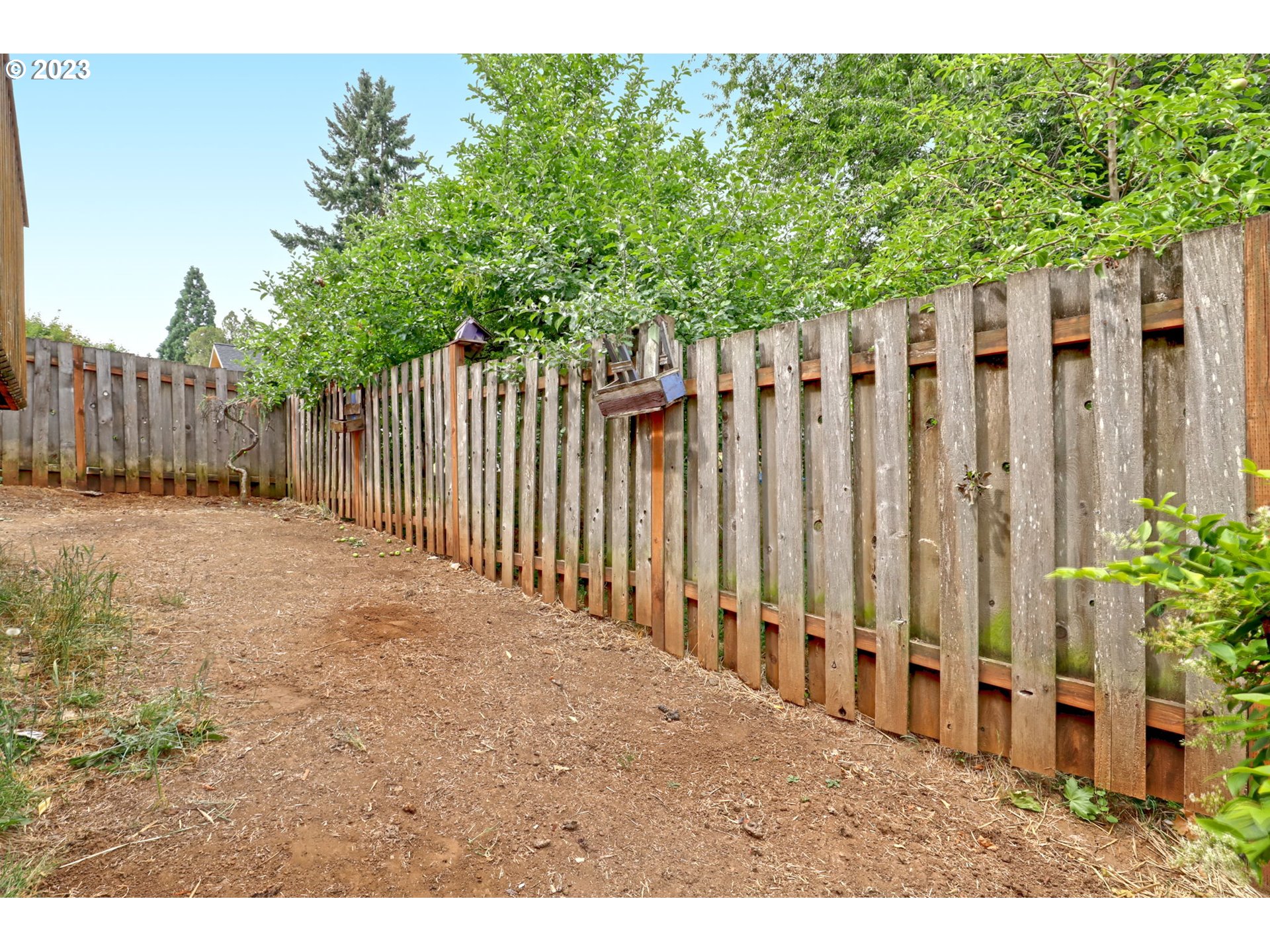 38909 Sandy Heights Street Sandy, OR 97055 - Photo 30 of 33 a view of a backyard with wooden fence