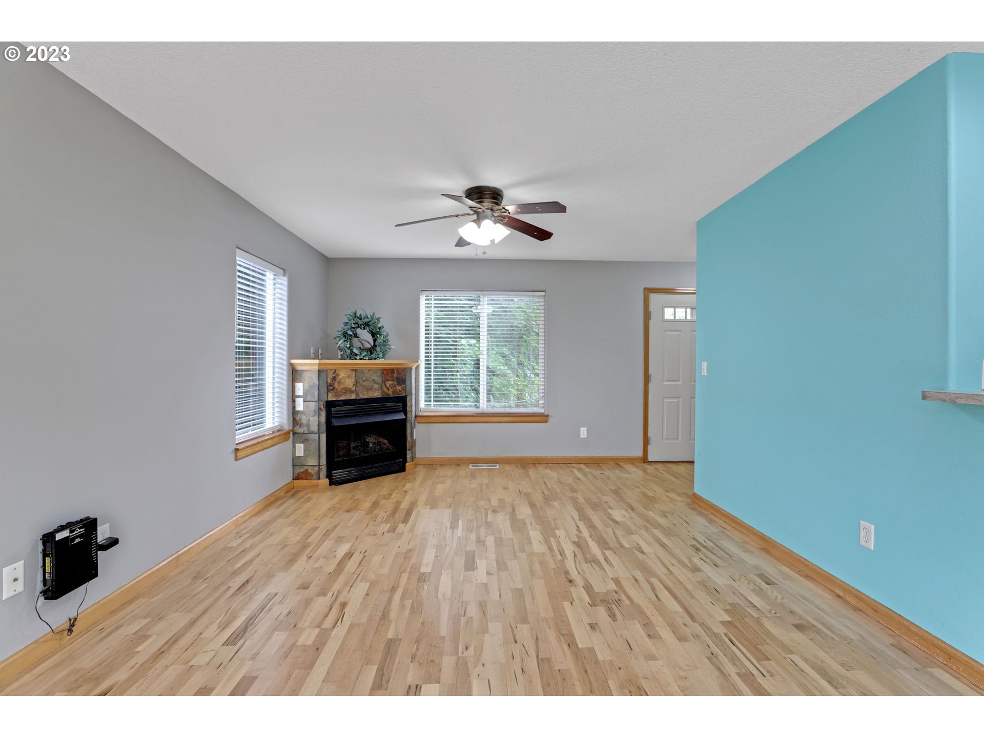 38909 Sandy Heights Street Sandy, OR 97055 - Photo 5 of 33 a living room with furniture and a chandelier