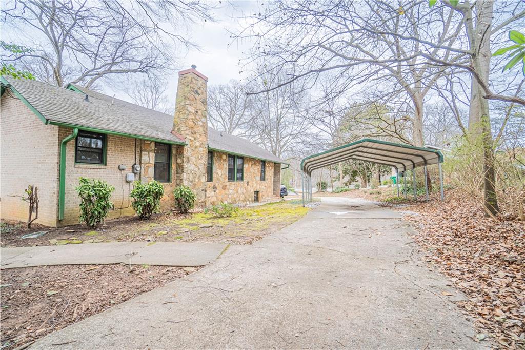 1865 Oak Grove Road Northeast Atlanta, GA 30345 - Photo 17 of 17 a front view of house with yard