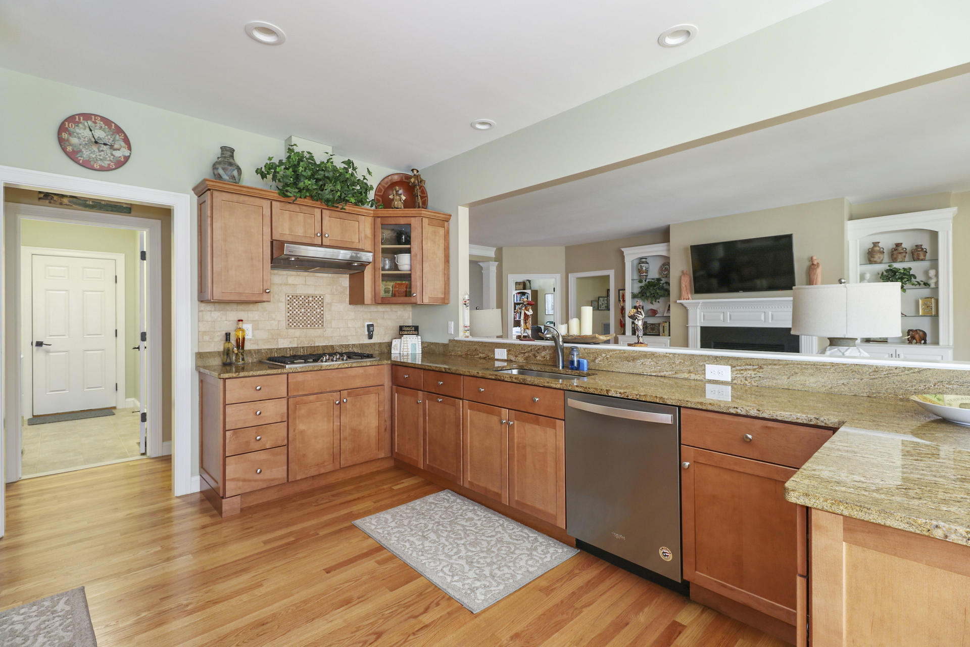 25 Dacey Drive Centerville, MA 02632 - Photo 11 of 40 a kitchen with stainless steel appliances granite countertop a sink and cabinets