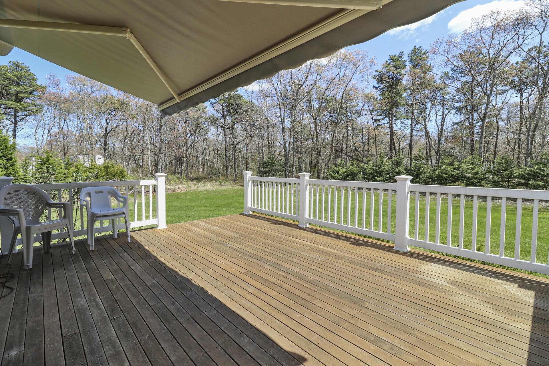 25 Dacey Drive Centerville, MA 02632 - Photo 20 of 40 a view of a deck with wooden floor and outdoor space