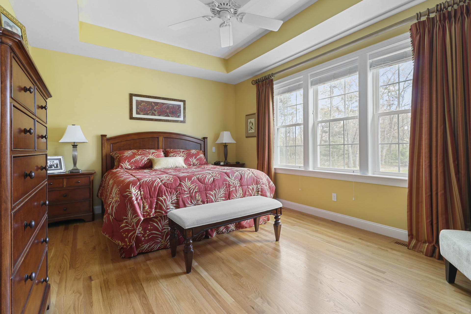 25 Dacey Drive Centerville, MA 02632 - Photo 21 of 40 a bedroom with a bed and wooden floor