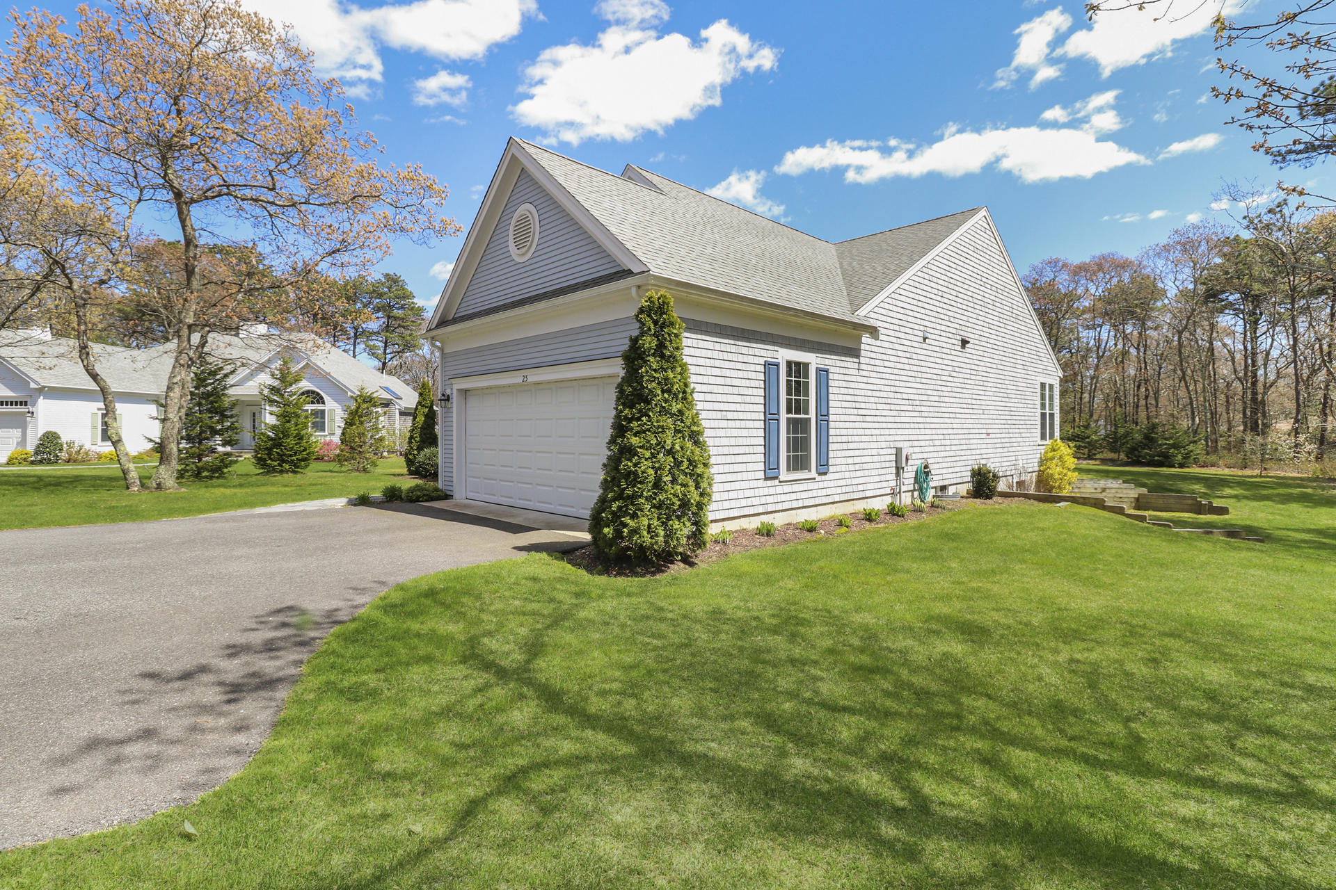 25 Dacey Drive Centerville, MA 02632 - Photo 37 of 40 a view of a house with backyard and tree