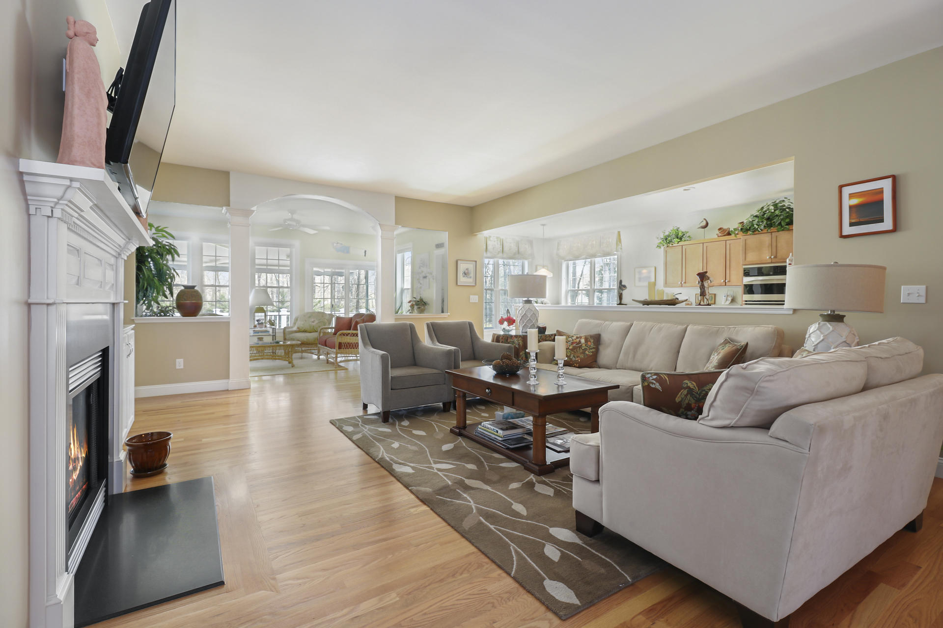25 Dacey Drive Centerville, MA 02632 - Photo 4 of 40 a living room with furniture wooden floor and a fireplace