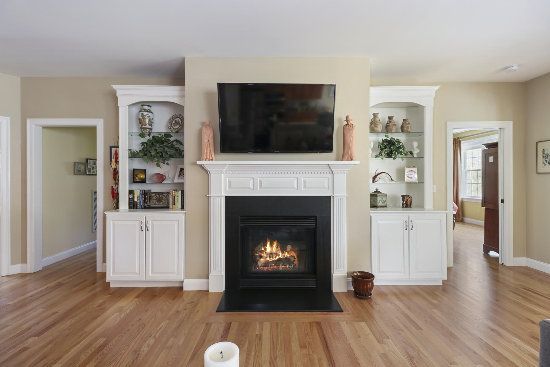 25 Dacey Drive Centerville, MA 02632 - Photo 6 of 40 a living room with furniture a flat screen tv and a fireplace
