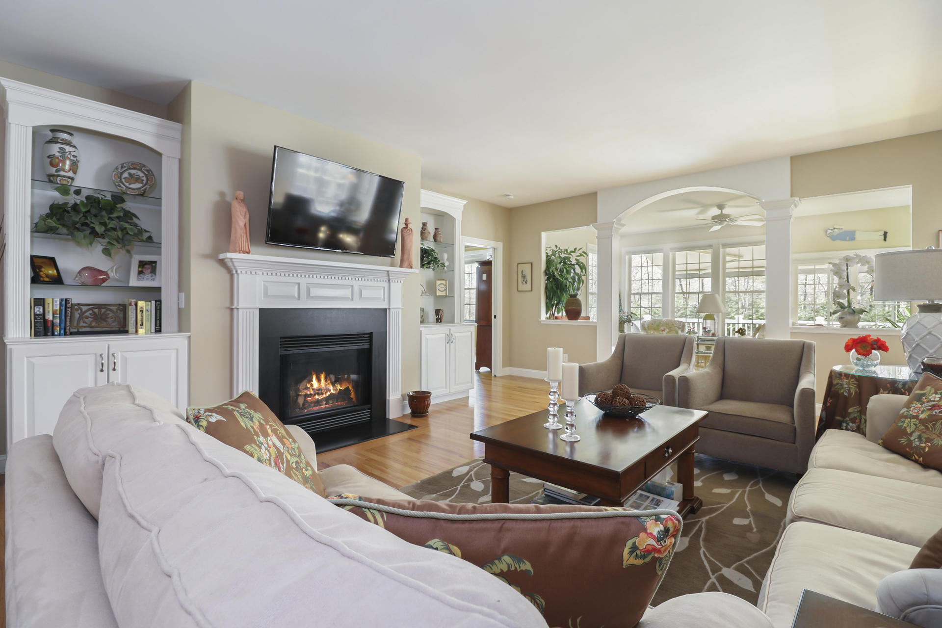 25 Dacey Drive Centerville, MA 02632 - Photo 7 of 40 a living room with furniture fireplace and a large window