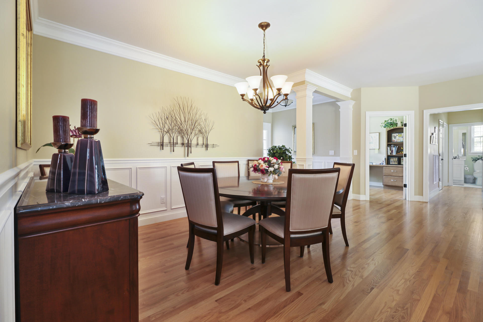 25 Dacey Drive Centerville, MA 02632 - Photo 9 of 40 a view of a dining room with furniture wooden floor and chandelier