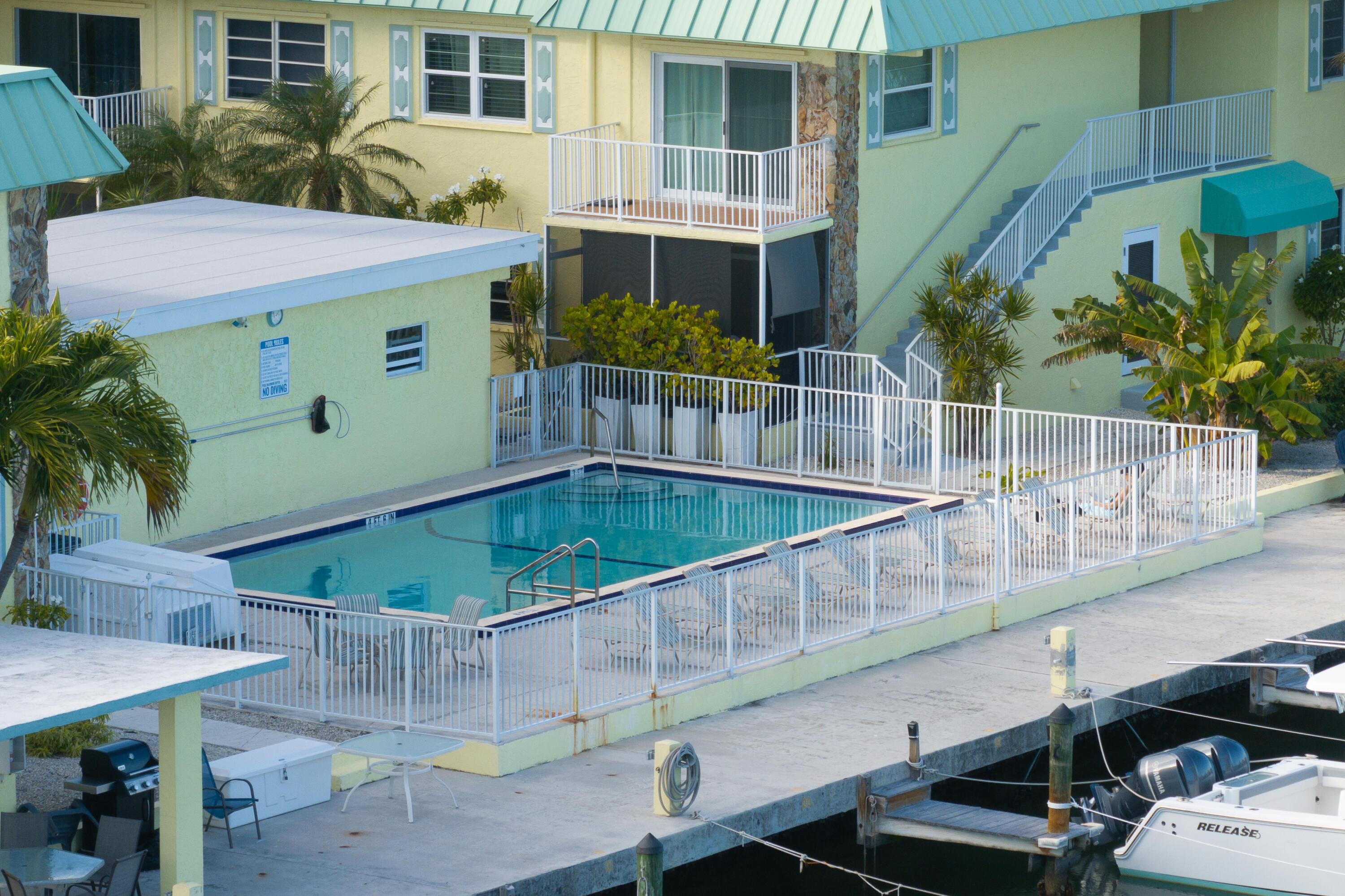105 Ave D, Unit 113 Marathon, FL 33050 - Photo 12 of 26 a view of a balcony with plants