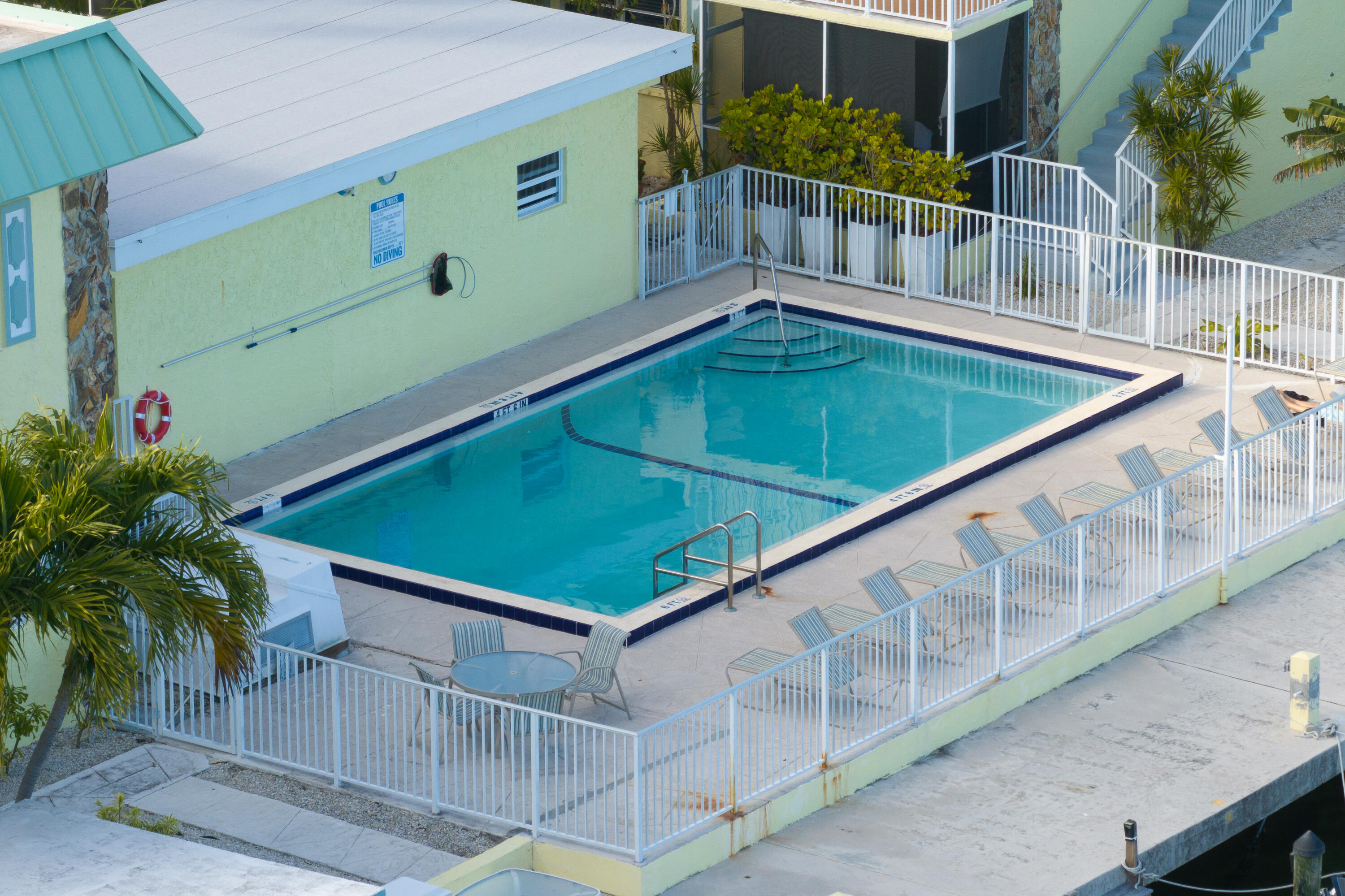 105 Ave D, Unit 113 Marathon, FL 33050 - Photo 13 of 26 a view of a balcony with an outdoor