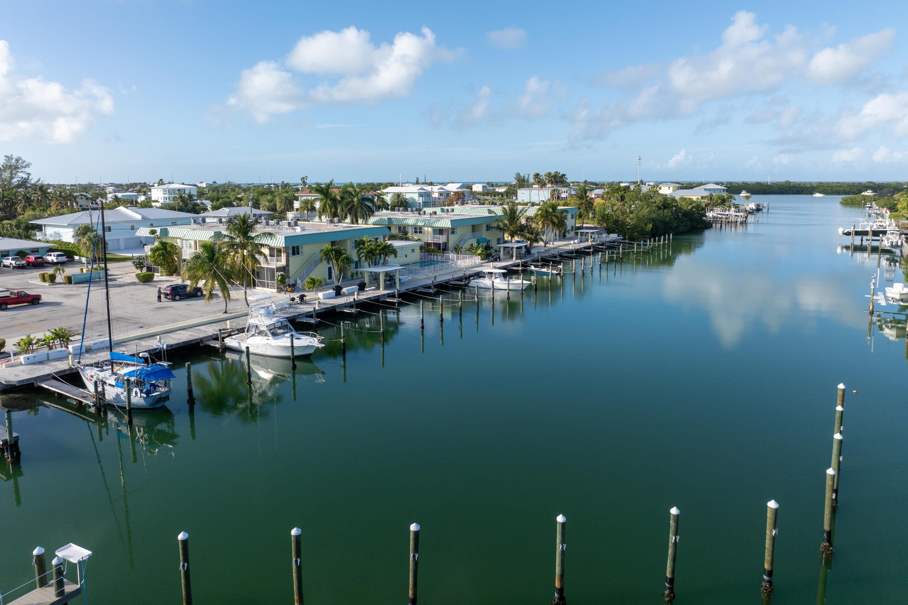 105 Ave D, Unit 113 Marathon, FL 33050 - Photo 20 of 26 a view of residential houses with outdoor space and lake view