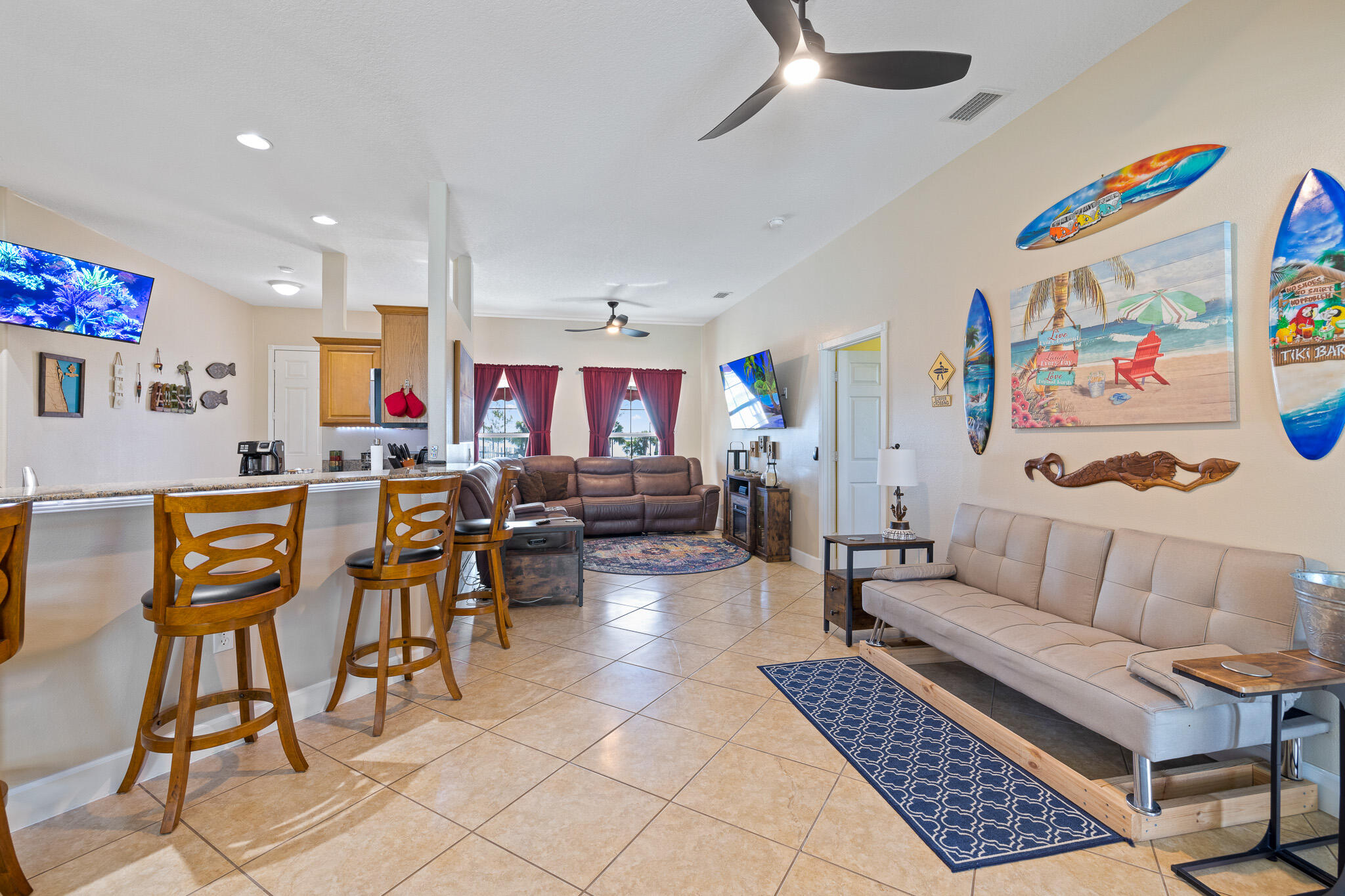 4320 S Highway Grant, FL 32949 - Photo 53 of 76 a living room with furniture and a rug