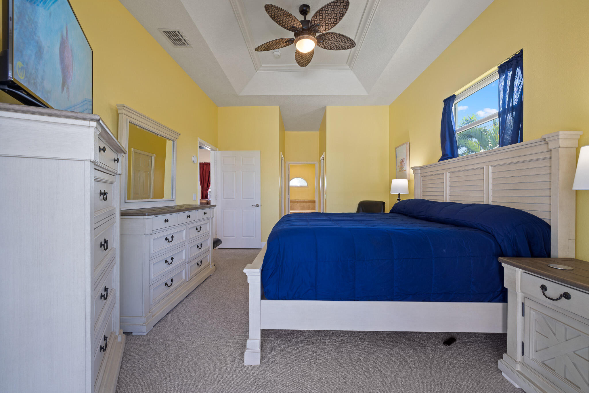4320 S Highway Grant, FL 32949 - Photo 55 of 76 a spacious bedroom with a bed dresser and a window