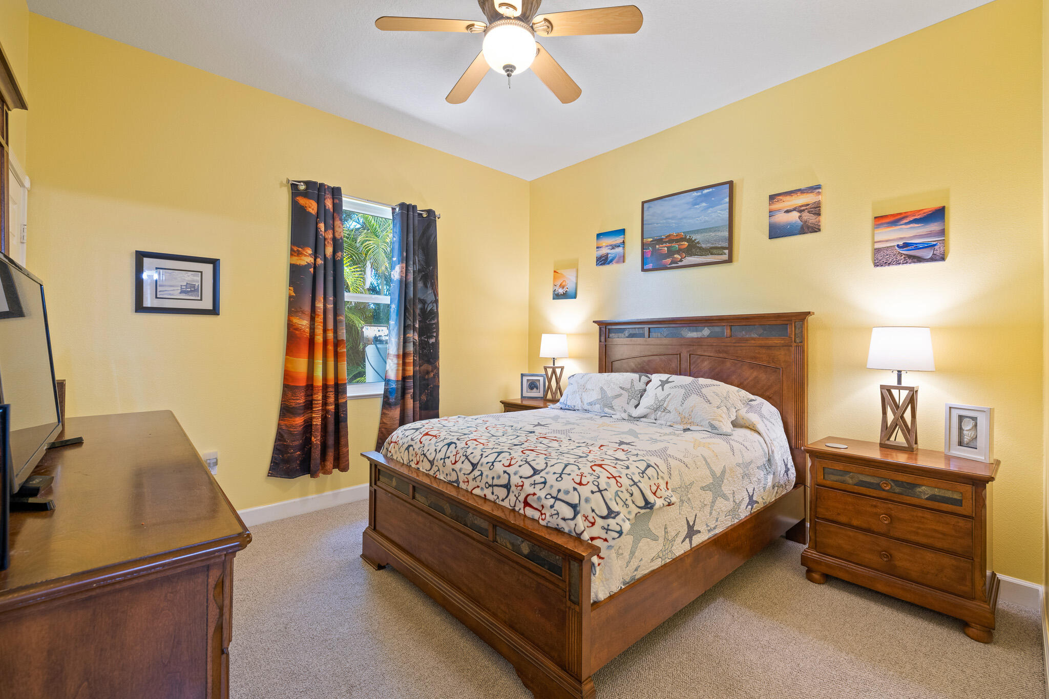 4320 S Highway Grant, FL 32949 - Photo 60 of 76 a bedroom with a bed and a flat screen tv