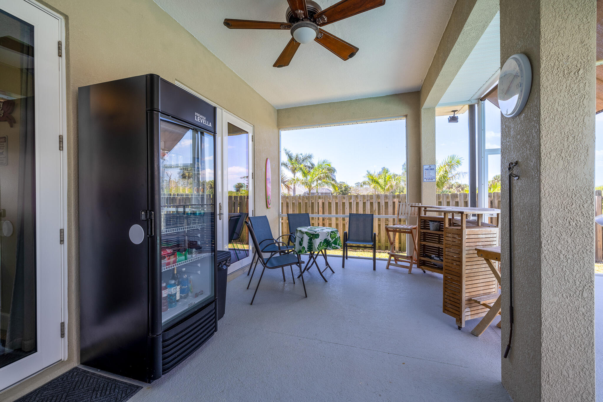 4320 S Highway Grant, FL 32949 - Photo 68 of 76 a view of a livingroom with furniture and a floor to ceiling window
