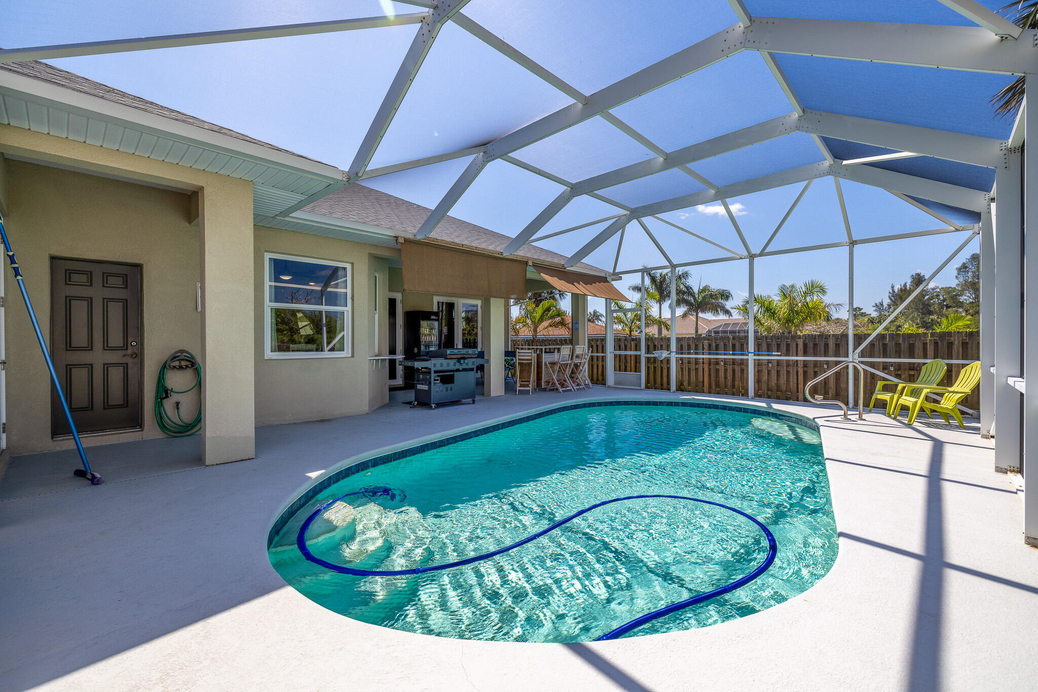 4320 S Highway Grant, FL 32949 - Photo 70 of 76 a view of a backyard with swimming pool