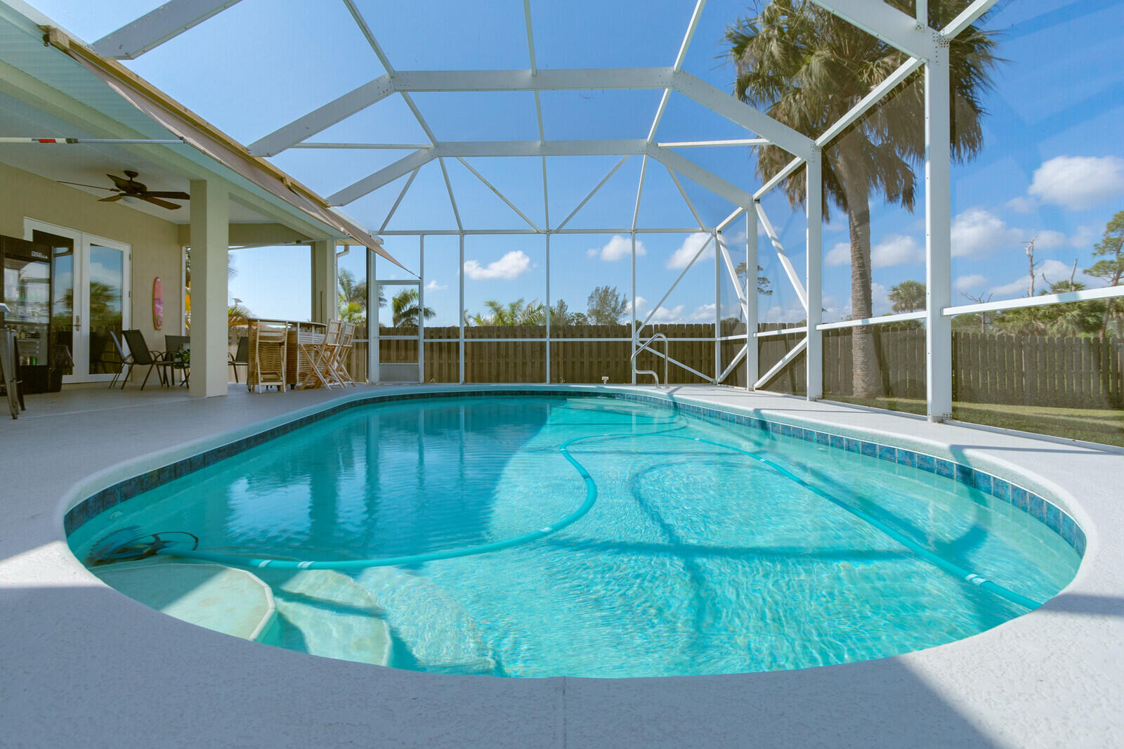 4320 S Highway Grant, FL 32949 - Photo 8 of 76 a view of a swimming pool with an outdoor seating