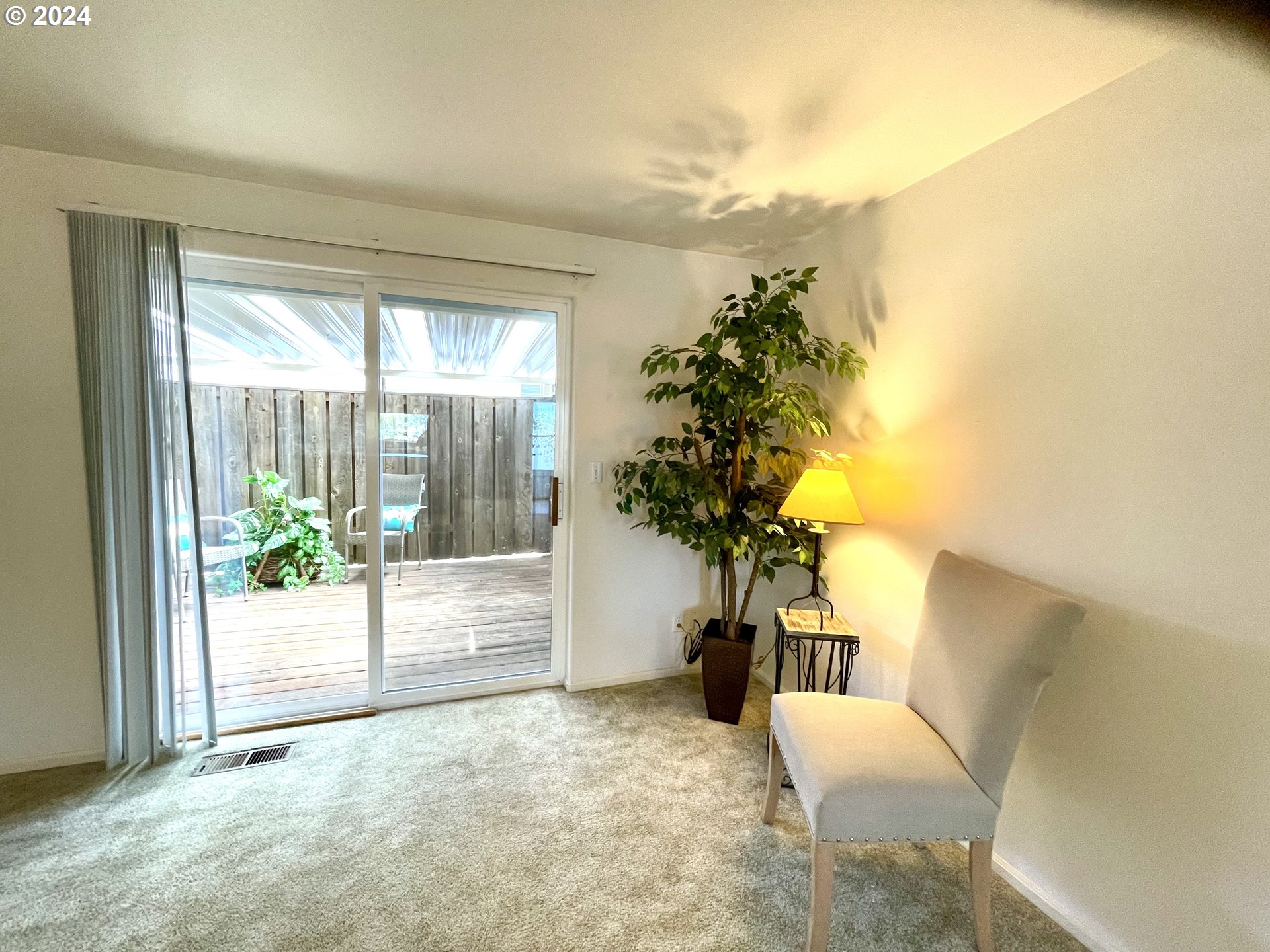 968 West L Street Springfield, OR 97477 - Photo 8 of 21 a living room with furniture and a potted plant