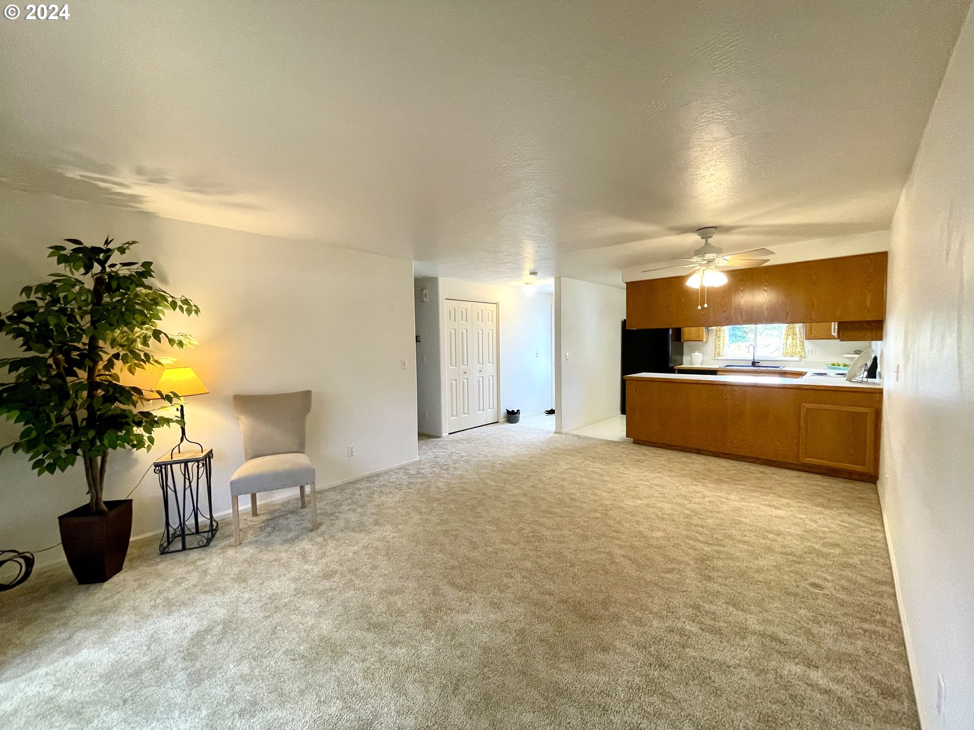 968 West L Street Springfield, OR 97477 - Photo 10 of 21 a view of a kitchen and living room
